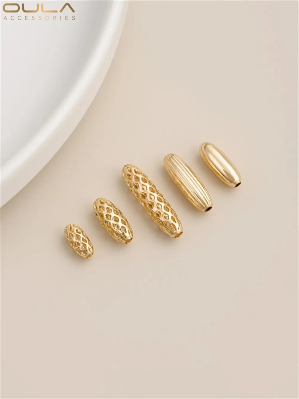 14K Gold-Color Plated Retro Hollow Oval Long Strip Rice Bead Handmade Earrings Accessories DIY Bracelet Necklace Accessories
14K Gold-Color Plated Retro Hollow Oval Long Strip Rice Bead Handmade Earrings Accessories DIY Bracelet Necklace Accessories