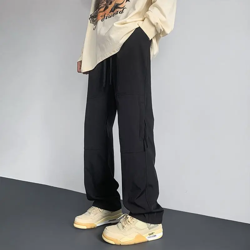 Spring Summer New Fashion Men's Clothing High Waist Pockets Ropa Hombre Solid Loose Korean Style Straight Cylinder Casual Pants
Spring Summer New Fashion Men's Clothing High Waist Pockets Ropa Hombre Solid Loose Korean Style Straight Cylinder Casual Pants
