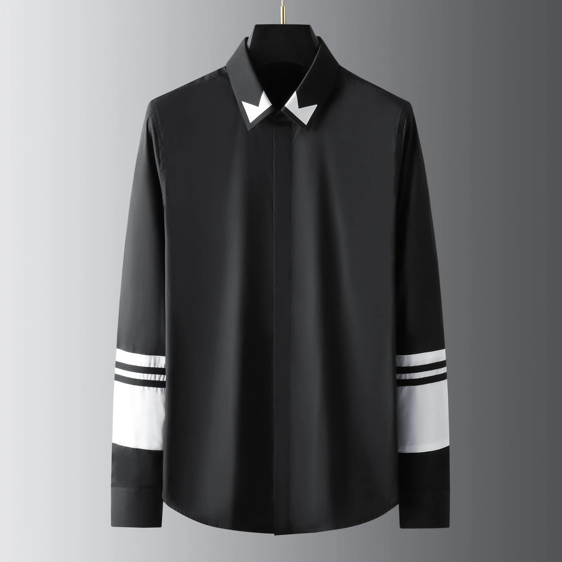 New collar pressed rubber sleeves black and white patchwork decoration men's long sleeves slim fit casual handsome shirt
New collar pressed rubber sleeves black and white patchwork decoration men's long sleeves slim fit casual handsome shirt