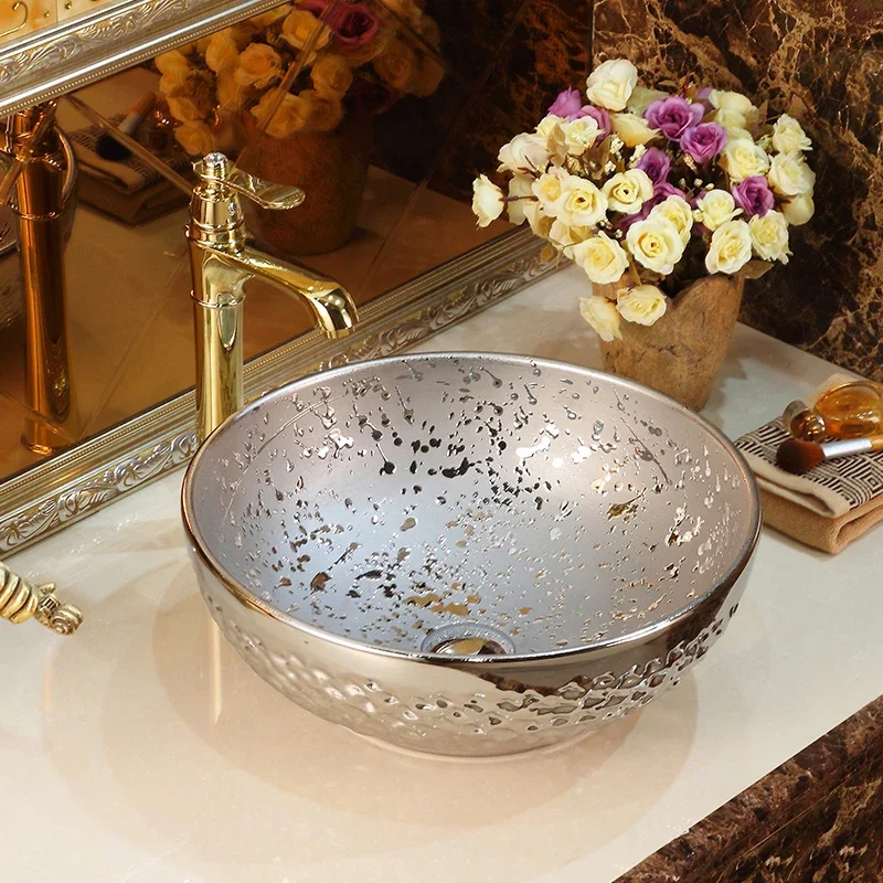 Personalized basin on the tablesilver art ceramic oval wash household wash wash basin
Personalized basin on the tablesilver art ceramic oval wash household wash wash basin
