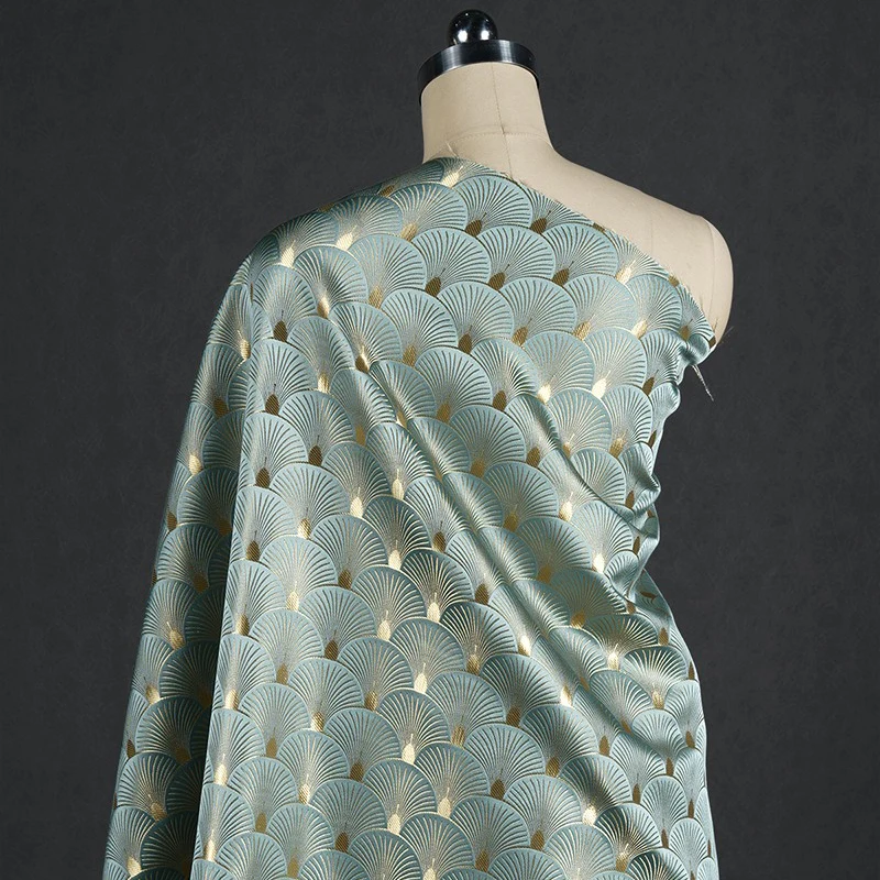 50x150cm Shiny Gold Luster Blue Jacquard Fabric Fan Shaped Ginkgo Leaf Woven Brocade Fabric For Diy Cheongsam Dress Jacket
50x150cm Shiny Gold Luster Blue Jacquard Fabric Fan Shaped Ginkgo Leaf Woven Brocade Fabric For Diy Cheongsam Dress Jacket