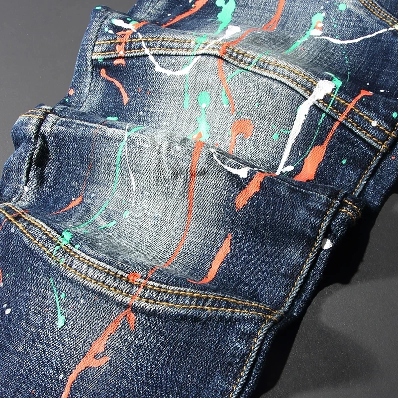 Y2KДизайнерские уличные модные мужские джинсы Винтажные синие эластичные джинсы Vintage Slim Fit с разрезом Мужские цветные джинсы в стиле хип-хоп Homb 
Y2KДизайнерские уличные модные мужские джинсы Винтажные синие эластичные джинсы Vintage Slim Fit с разрезом Мужские цветные джинсы в стиле хип-хоп Homb