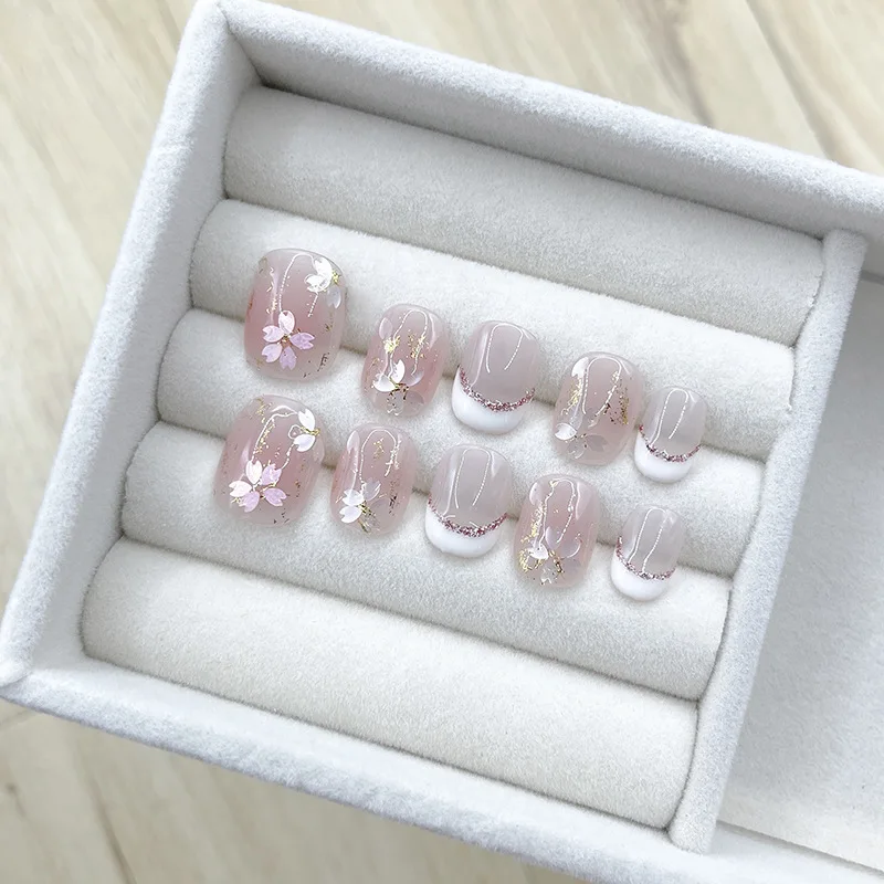 10Pcs Handmade Nails Gentle Pink with Cherry Blossom&Glitter Accents French Tip False Nail for Women&Girl Removable Wear Nail
10Pcs Handmade Nails Gentle Pink with Cherry Blossom&Glitter Accents French Tip False Nail for Women&Girl Removable Wear Nail
