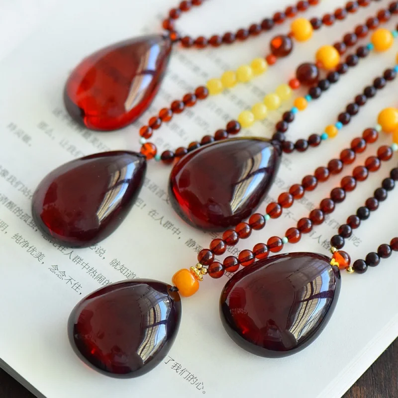 Blood Amber Drop Pendant Color Reddish Size Approximately 39x30x16mm
Blood Amber Drop Pendant Color Reddish Size Approximately 39x30x16mm