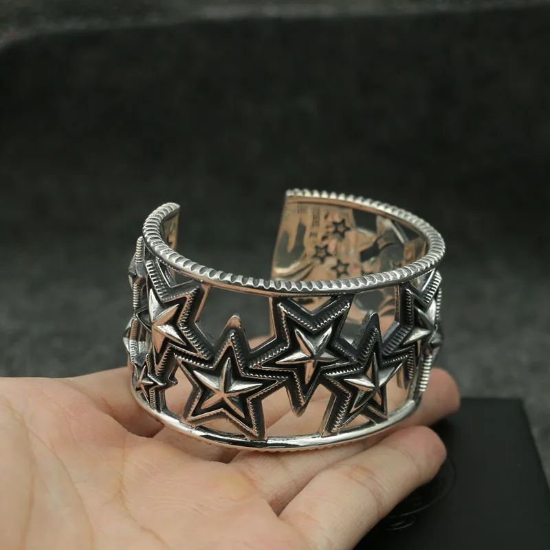 Fashionable Asian five pointed star sterling silver S925 oversized bracelet, super wide and domineering hollow out men's retro b
Fashionable Asian five pointed star sterling silver S925 oversized bracelet, super wide and domineering hollow out men's retro b