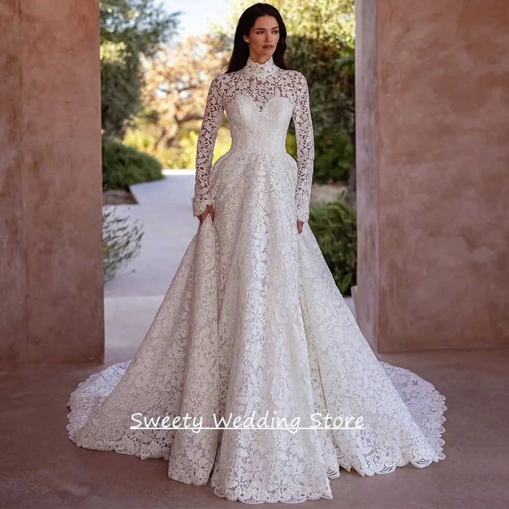 Арабское кружевное свадебное платье на заказ с длинными рукавами, высоким воротом, изысканное женское свадебное платье со шлейфом, Vestido De Noiva
Арабское кружевное свадебное платье на заказ с длинными рукавами, высоким воротом, изысканное женское свадебное платье со шлейфом, Vestido De Noiva