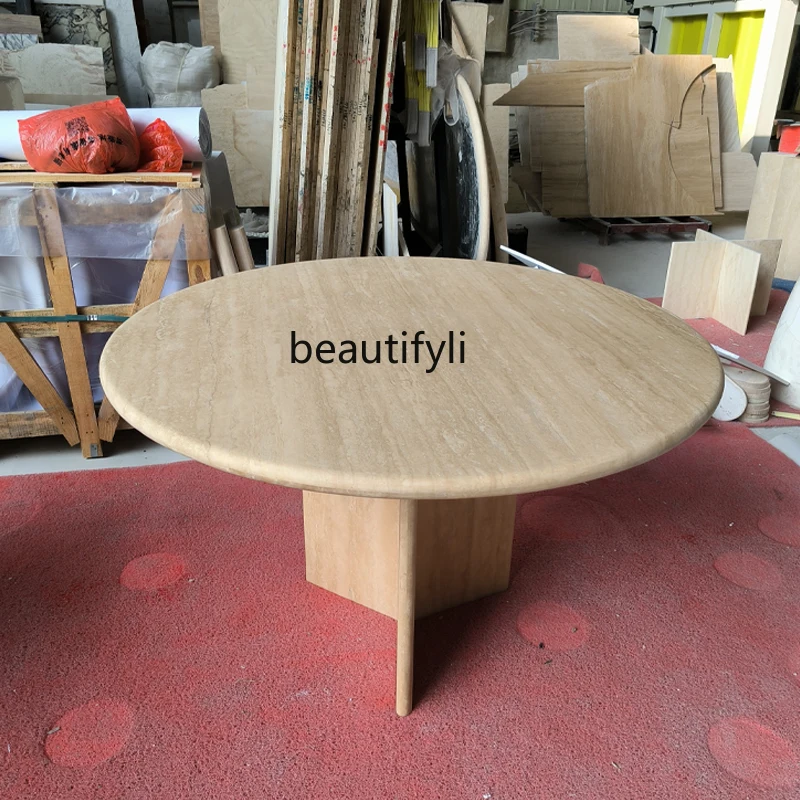 Italian light luxury natural travertine modern simple marble dining table dining table round living room furniture dining table 
Italian light luxury natural travertine modern simple marble dining table dining table round living room furniture dining table