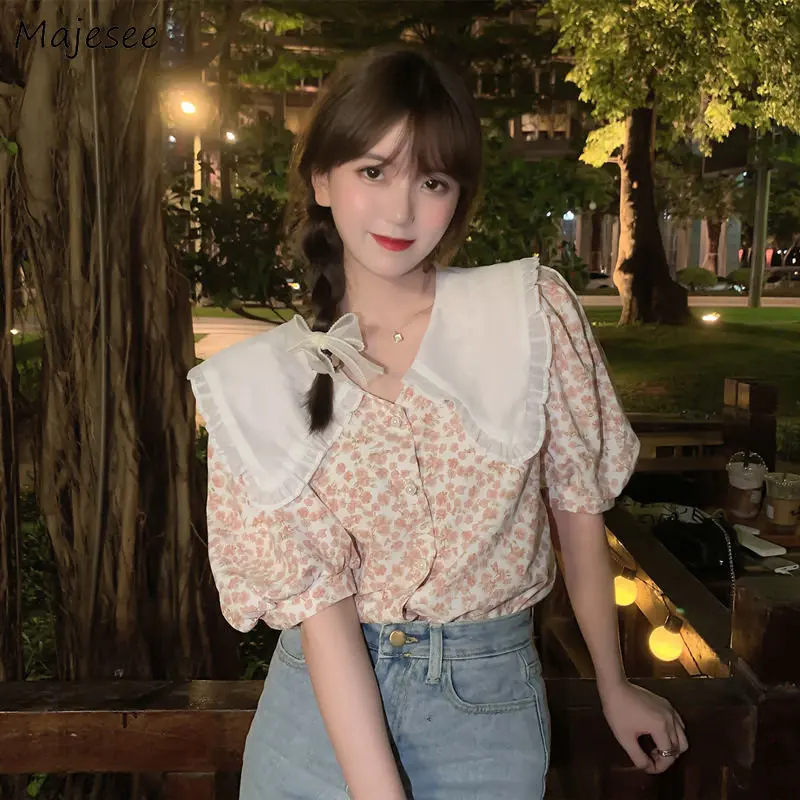 Peter Pan Collar Floral Shirts Women Sweet Girls Summer Loose Korean Fashion Tops All-match College Temperament Ladies Hot Sale
Peter Pan Collar Floral Shirts Women Sweet Girls Summer Loose Korean Fashion Tops All-match College Temperament Ladies Hot Sale