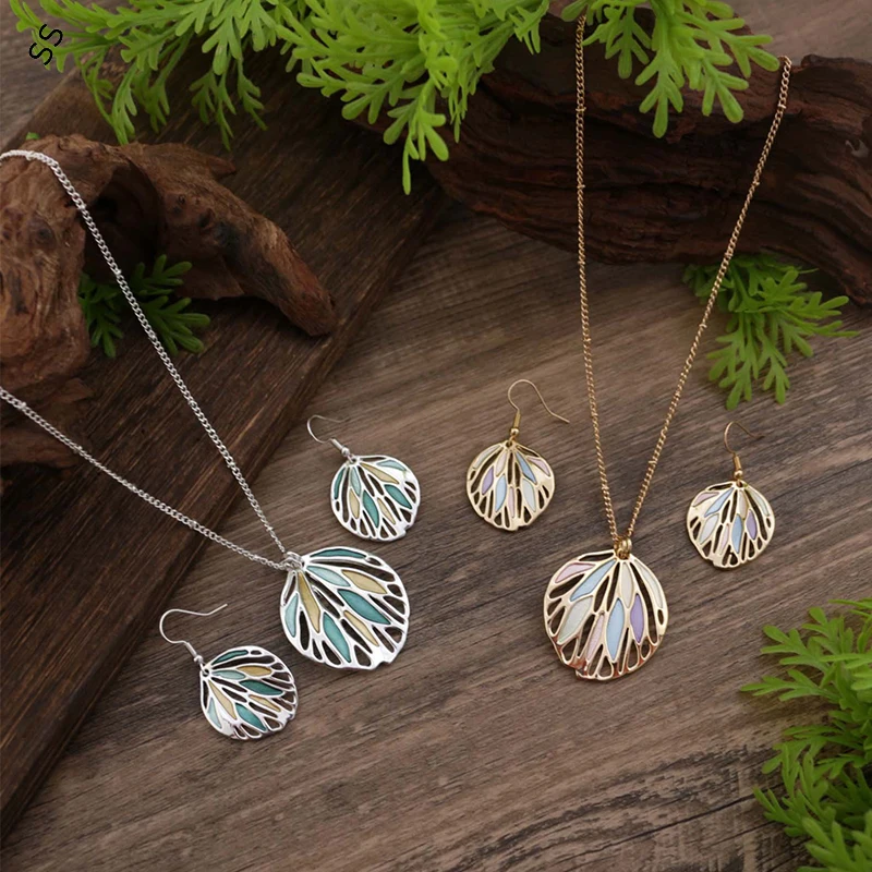 Enamel Hollow Leaf Earrings & Necklace Set, Hand-Painted Bohemian Jewelry, Nature-Inspired Gift for Women
Enamel Hollow Leaf Earrings & Necklace Set, Hand-Painted Bohemian Jewelry, Nature-Inspired Gift for Women