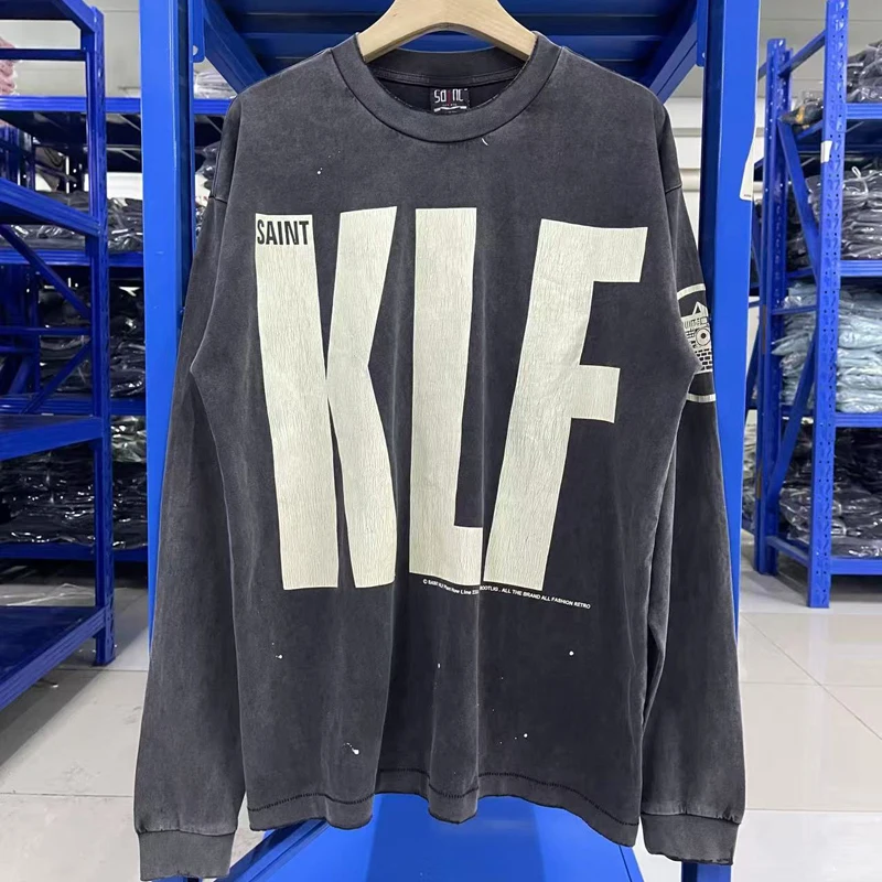 Большая потрескавшаяся футболка с логотипом KLF и длинным рукавом, черные потертые топы для мужчин и женщин, свободная футболка с принтом на спине и камерой, одежда
Большая потрескавшаяся футболка с логотипом KLF и длинным рукавом, черные потертые топы для мужчин и женщин, свободная футболка с принтом на спине и камерой, одежда