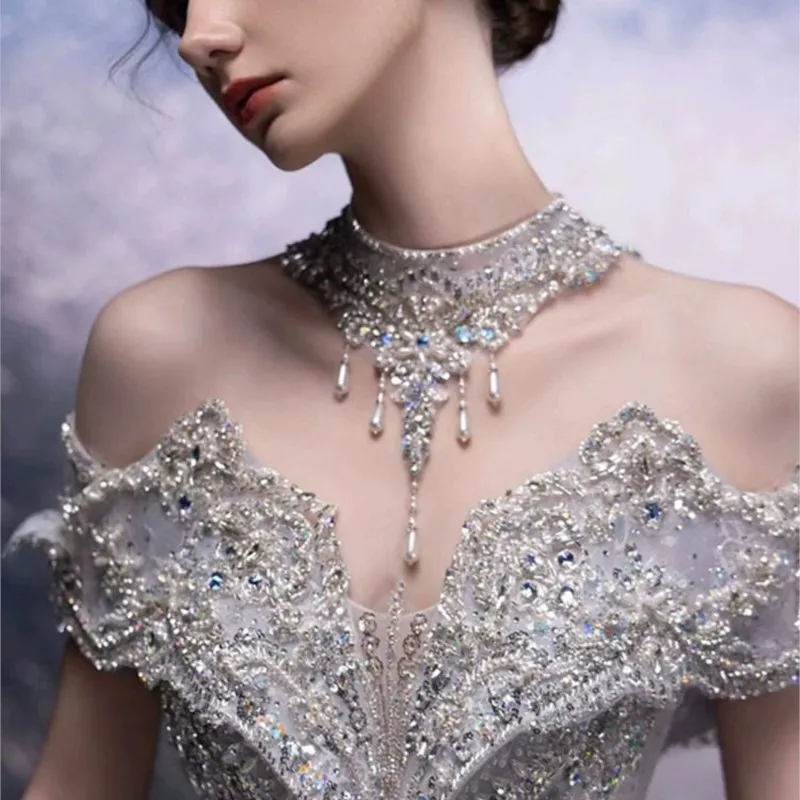 A new white, heavy-duty, luxurious one-shoulder dress with large tailline
A new white, heavy-duty, luxurious one-shoulder dress with large tailline
