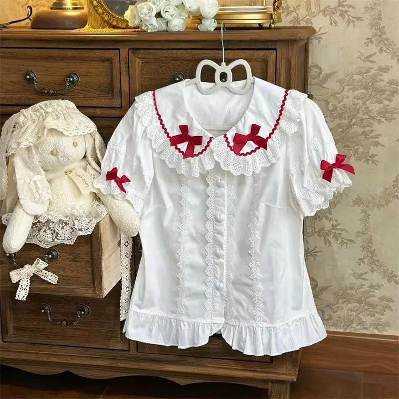Onalippa, французский дизайн, ниша, милый кукольный воротник, белая рубашка в стиле Лолиты с короткими рукавами, женская белая рубашка, новинка 2025, летний топ с бантом
Onalippa, французский дизайн, ниша, милый кукольный воротник, белая рубашка в стиле Лолиты с короткими рукавами, женская белая рубашка, новинка 2025, летний топ с бантом