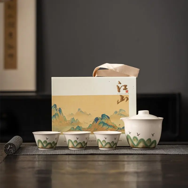 Дорожный чайный сервиз «Тысяча реки и горы», керамическая чашка для быстрой клиентов, портативные инструменты для питья и заваривания на открытом воздухе.
Дорожный чайный сервиз «Тысяча реки и горы», керамическая чашка для быстрой клиентов, портативные инструменты для питья и заваривания на открытом воздухе.