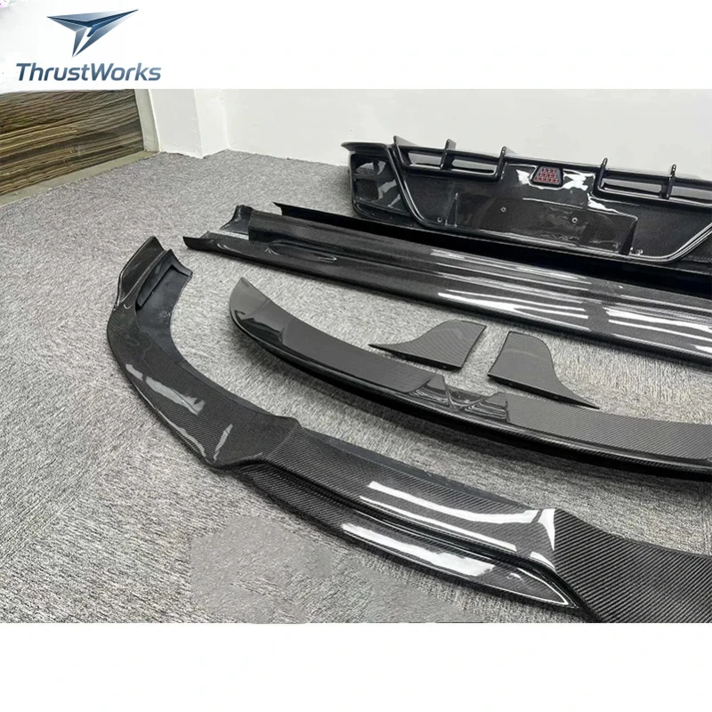 ThrustWorks C Style Body Kit Wet Carbon Fiber - Full Aero Package: Front Lip, Side Skirts, Rear Durle New
ThrustWorks C Style Body Kit Wet Carbon Fiber - Full Aero Package: Front Lip, Side Skirts, Rear Durle New