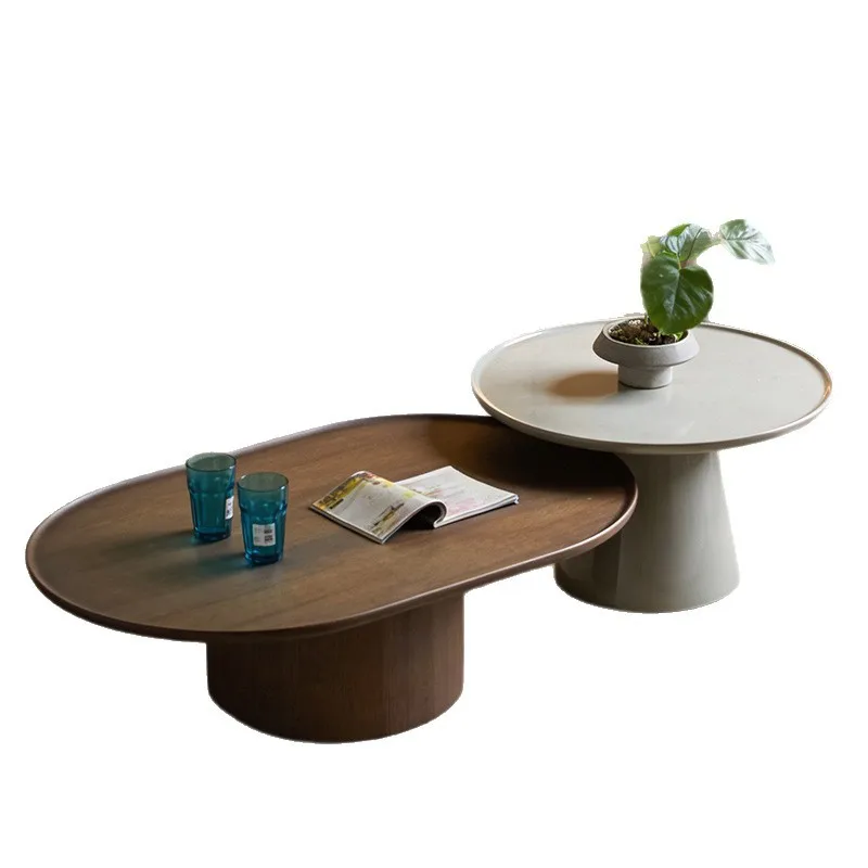 Modern light luxury oval living room coffee table combination, small minimalist creative tea table
Modern light luxury oval living room coffee table combination, small minimalist creative tea table