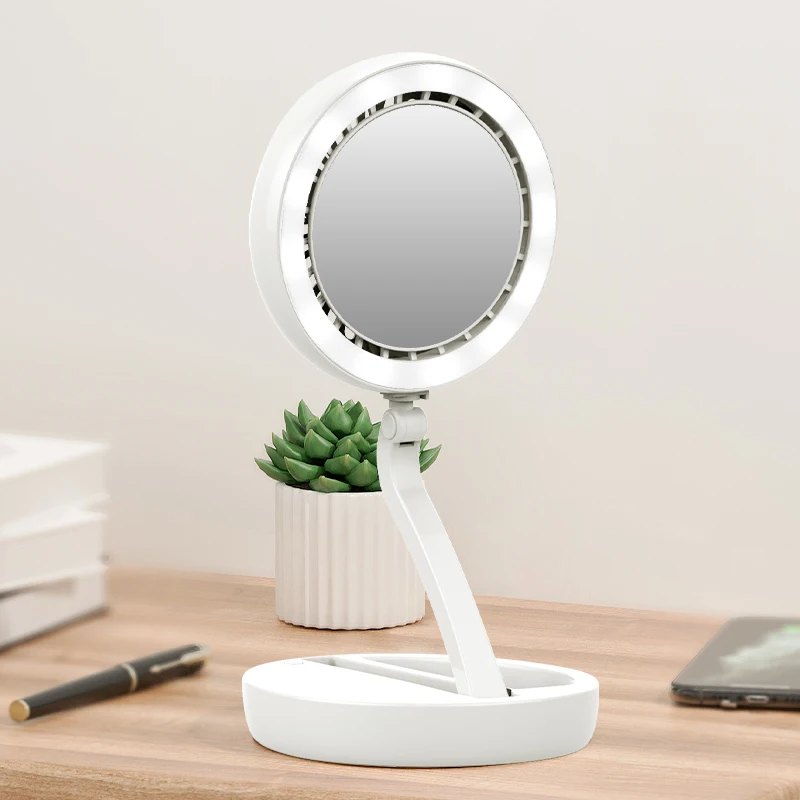 Foldable LED Makeup mirror with fan 3-in-1 Desktop Lamp with Fan and Removable Vanity Mirror USB Charging for home /outdoor
Foldable LED Makeup mirror with fan 3-in-1 Desktop Lamp with Fan and Removable Vanity Mirror USB Charging for home /outdoor