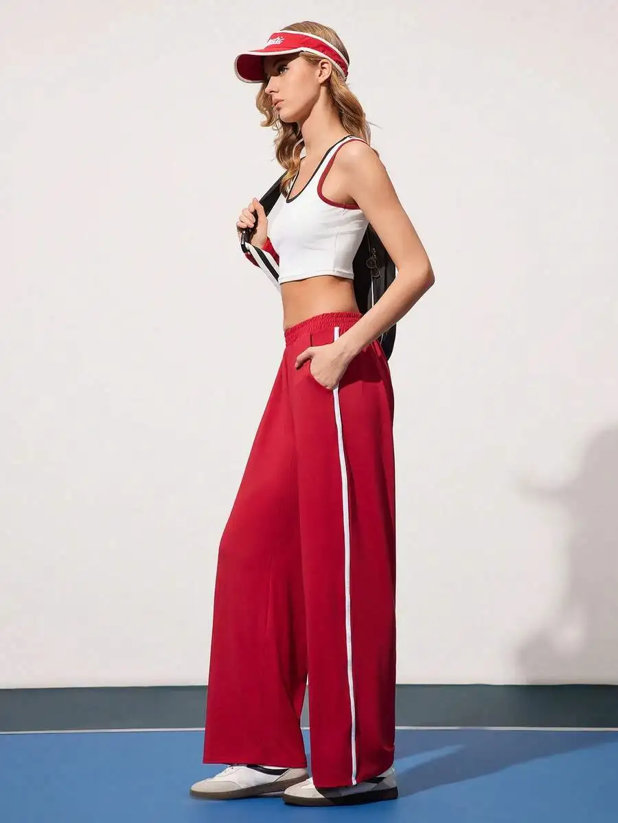 Womens Solid Color Wide Leg Sport Pants With Side Stripe
Womens Solid Color Wide Leg Sport Pants With Side Stripe