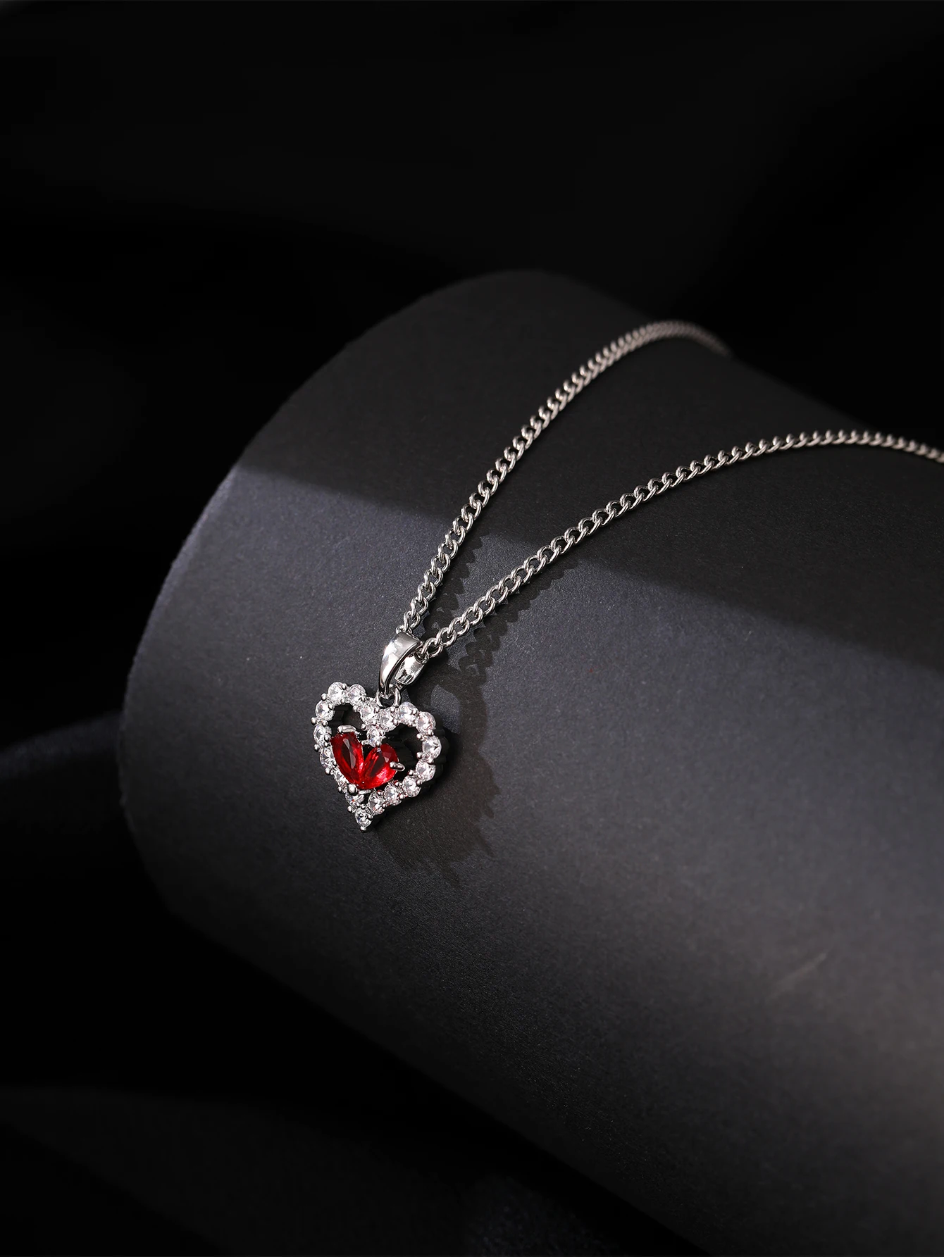 Elegant Silvery Chain Necklace with Red Heart Hollow Zircon Pendant Fashionable Romantic Party Daily Wear Accessory
Elegant Silvery Chain Necklace with Red Heart Hollow Zircon Pendant Fashionable Romantic Party Daily Wear Accessory