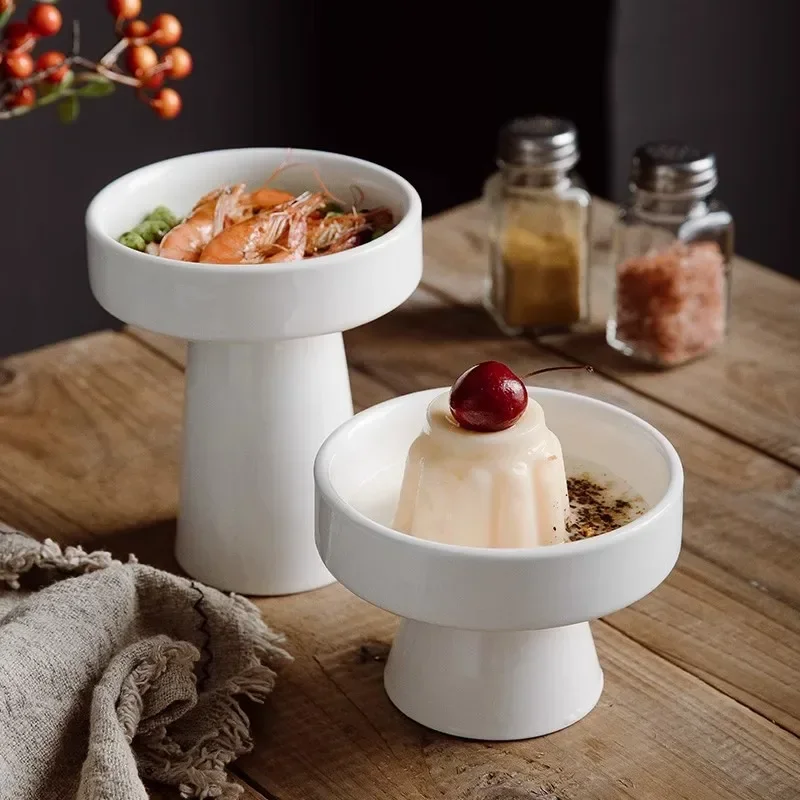 Pure White Ceramic Tall High Foot Plate Hotel Restaurant Creative Dishes Cold Vegetable Bowl Tea Point Dim Sum Display Plate
Pure White Ceramic Tall High Foot Plate Hotel Restaurant Creative Dishes Cold Vegetable Bowl Tea Point Dim Sum Display Plate
