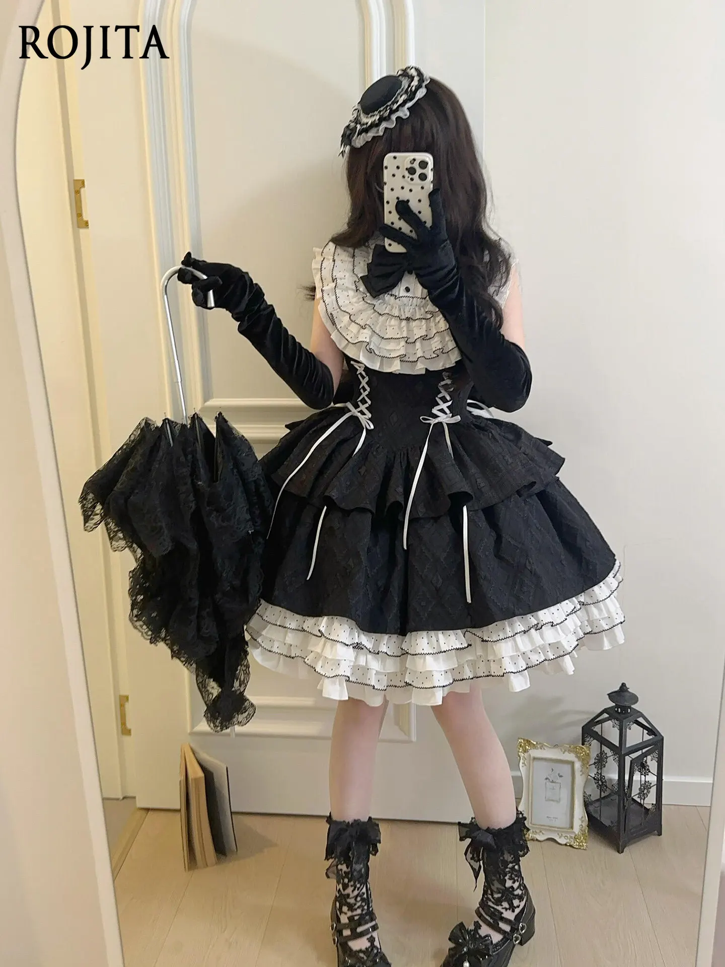 Women's Gothic Sweet Lolita JSK Dress Black White Contrast Ruffle Collar Corset Lace-up Tiered Cake Dress Sleeveless Dress
Women's Gothic Sweet Lolita JSK Dress Black White Contrast Ruffle Collar Corset Lace-up Tiered Cake Dress Sleeveless Dress