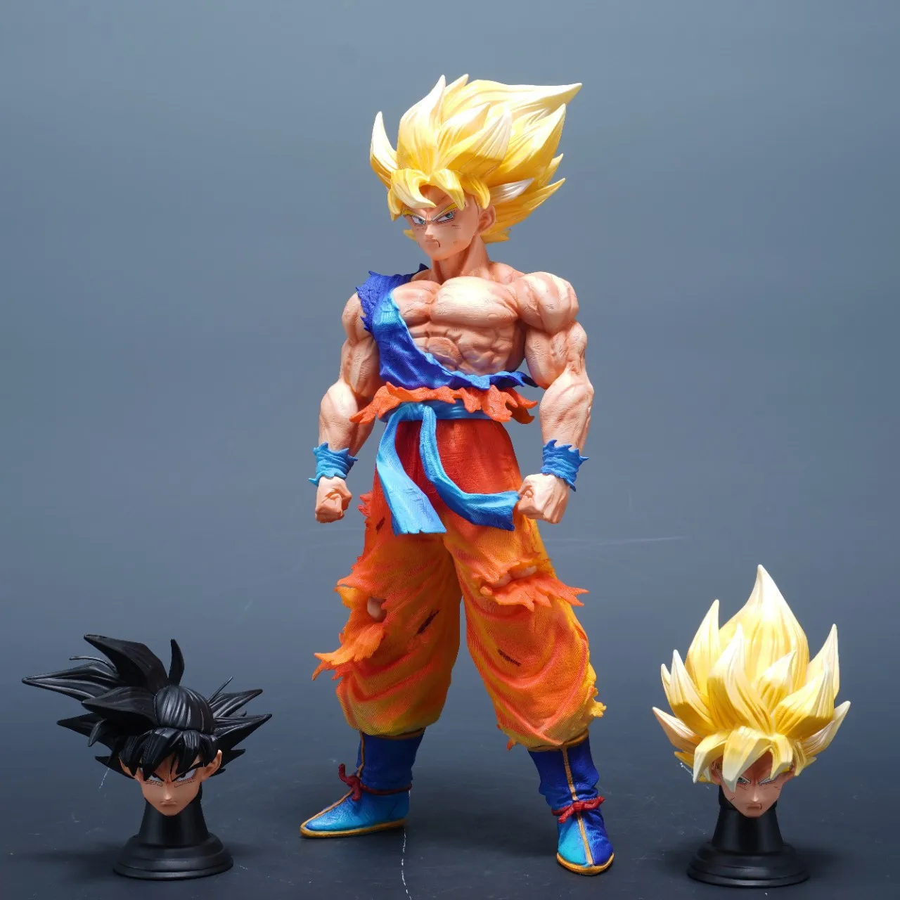 Anime Dragon Ball Z Super Saiyan Goku Kakarot Statue model Three head sculptures can be replaced Desktop decoration collection 
Anime Dragon Ball Z Super Saiyan Goku Kakarot Statue model Three head sculptures can be replaced Desktop decoration collection