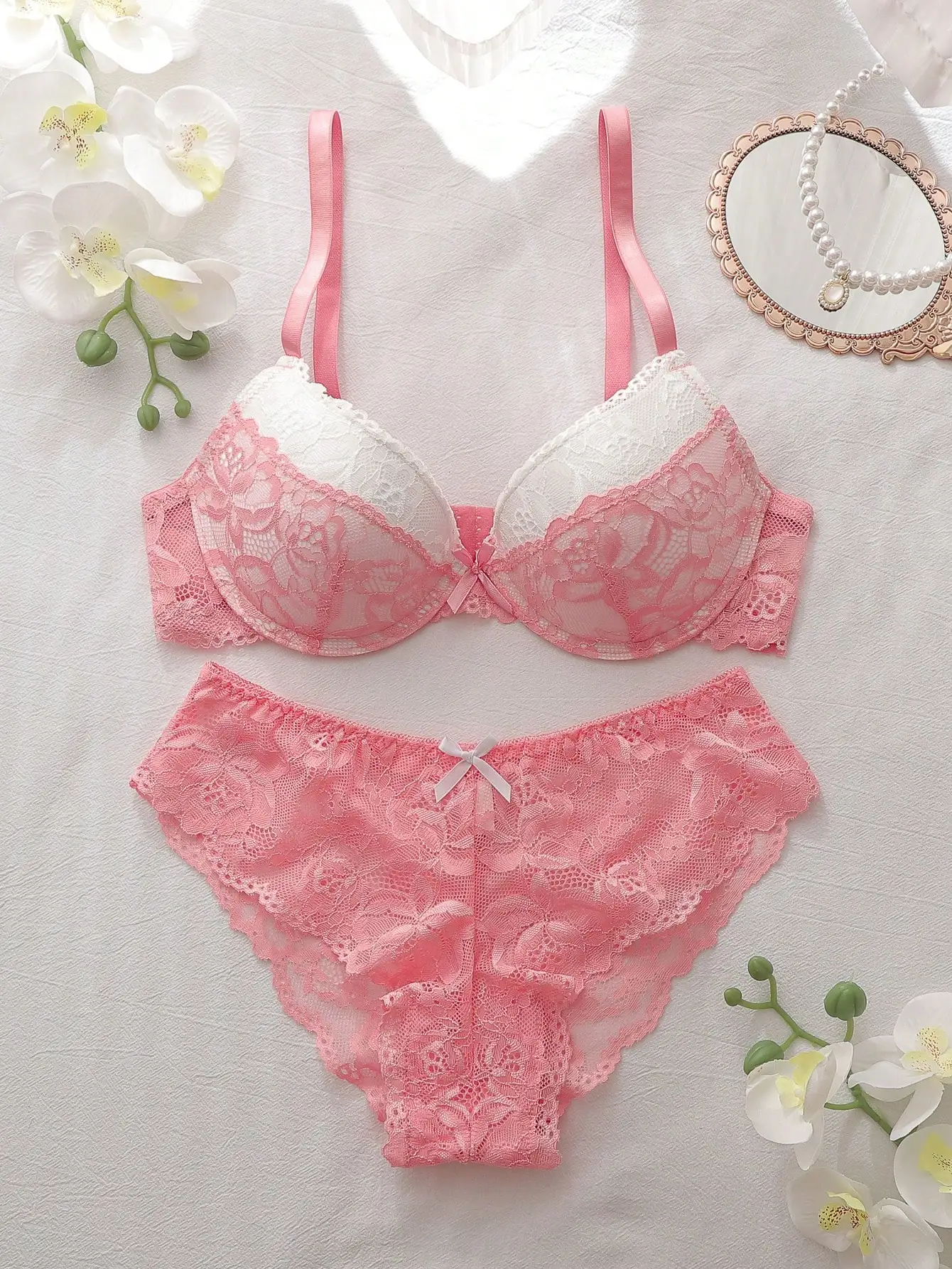 Pink and White Lace Patchwork Bralette and Panty Set with Bow Detail
Pink and White Lace Patchwork Bralette and Panty Set with Bow Detail