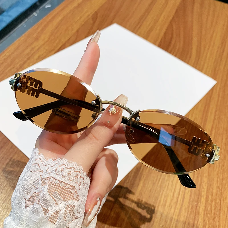 Oval Frame Sunglasses New Rimless Cut Edge Personality Glasses Fashion Design Sense Small Frame Sunglasses 90289
Oval Frame Sunglasses New Rimless Cut Edge Personality Glasses Fashion Design Sense Small Frame Sunglasses 90289