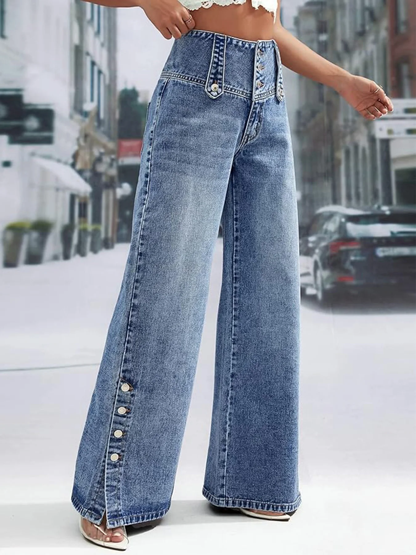 Women's high waisted light blue snowflake denim, high waisted buckle design, pants legs with snap buttons, boot pants
Women's high waisted light blue snowflake denim, high waisted buckle design, pants legs with snap buttons, boot pants