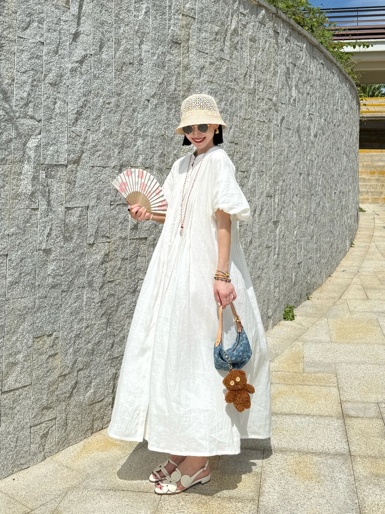 Летнее французское льняное платье свободного кроя белого цвета с точечным узором, завышенной талией, короткими рукавами и застежкой на пуговицах, юбка А-силуэта
Летнее французское льняное платье свободного кроя белого цвета с точечным узором, завышенной талией, короткими рукавами и застежкой на пуговицах, юбка А-силуэта