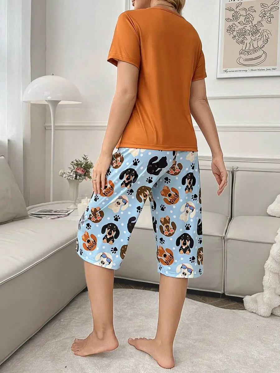 Orange Short Sleeve Top And Dog Print Knee Length Pajama Set With Pockets
Orange Short Sleeve Top And Dog Print Knee Length Pajama Set With Pockets