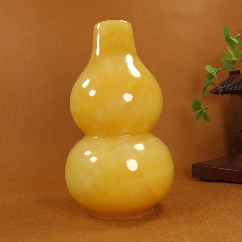 Natural Yellow Jade Jade Gourd Living Room Decorations Attract Wealth Decoration
Natural Yellow Jade Jade Gourd Living Room Decorations Attract Wealth Decoration