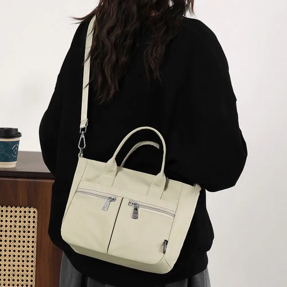 Casual Oxford Cloth Crossbody Bag Solid Color Multi-pocket Nylon Cloth Handbag Wide Shoulder Strap Lightweight Canvas Tote Bag
Casual Oxford Cloth Crossbody Bag Solid Color Multi-pocket Nylon Cloth Handbag Wide Shoulder Strap Lightweight Canvas Tote Bag