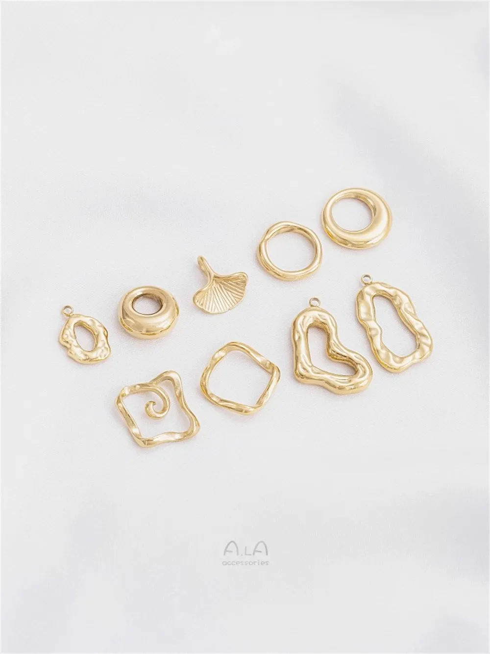 Titanium Steel Vacuum Plated 14K Real Gold Irregular Geometric Heart Ring Apricot Leaf Pendant DIY Ear Jewelry Charms Pendant
Titanium Steel Vacuum Plated 14K Real Gold Irregular Geometric Heart Ring Apricot Leaf Pendant DIY Ear Jewelry Charms Pendant