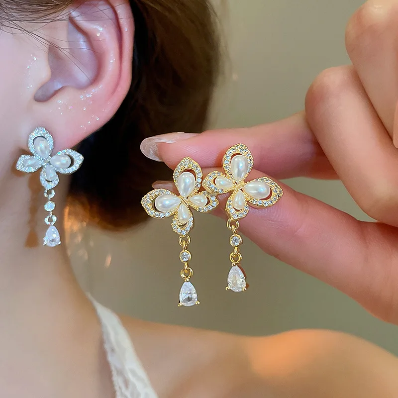Minar Textured CZ Cubic Zirconia Imitation Pearl Hollow Butterfly Wings Tassel Drop Earrings for Women 18K Gold Silver Copper
Minar Textured CZ Cubic Zirconia Imitation Pearl Hollow Butterfly Wings Tassel Drop Earrings for Women 18K Gold Silver Copper