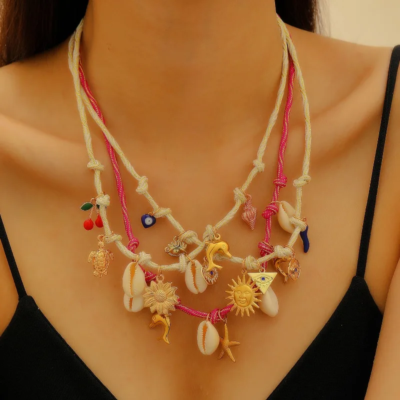 Bohemian Vacation Wind Alloy Cherry Shell Starfish Flower Knotted Tassel Pendant Ladies Woven Necklace
Bohemian Vacation Wind Alloy Cherry Shell Starfish Flower Knotted Tassel Pendant Ladies Woven Necklace