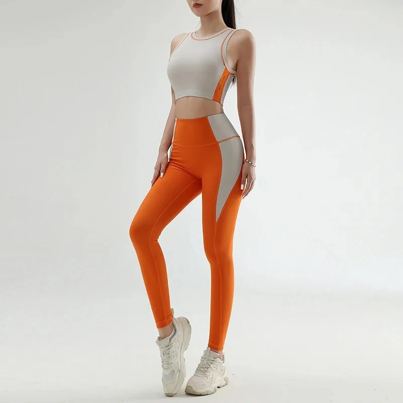 Women's color clashing quick-drying yoga clothes suit gym training clothes suit gathered undershirt lifting hip tight pants
Women's color clashing quick-drying yoga clothes suit gym training clothes suit gathered undershirt lifting hip tight pants