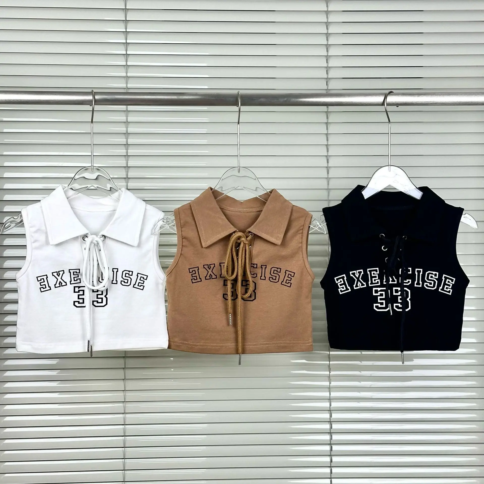 Girls summer new lace-up vest Korean version letters middle and large children lapel short polo shirt fashion sleeveless tops
Girls summer new lace-up vest Korean version letters middle and large children lapel short polo shirt fashion sleeveless tops