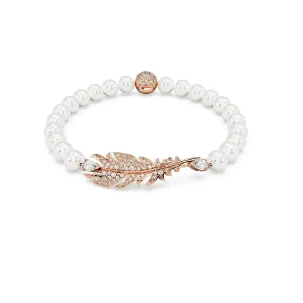 New high-quality Idyllia feather rose gold pearl set with niche design, women's romantic holiday jewelry gift
New high-quality Idyllia feather rose gold pearl set with niche design, women's romantic holiday jewelry gift