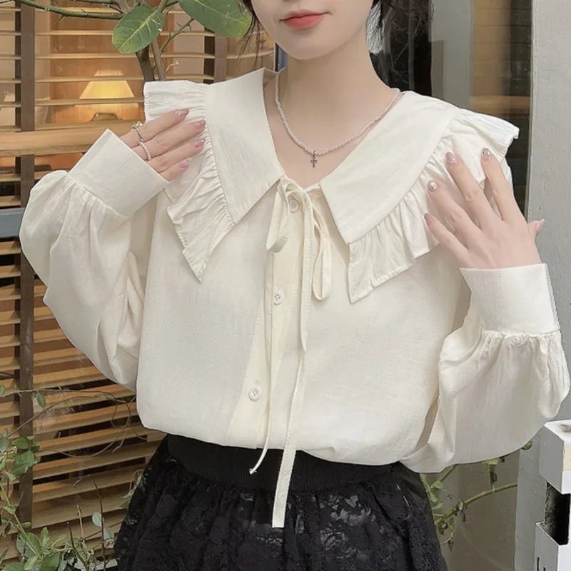 Ruffles Lace Up Long Sleeve Sweet Shirts For Women Spring Summer Peter Pan Collar Loose Tops Preppy Style Solid Color Blouses
Ruffles Lace Up Long Sleeve Sweet Shirts For Women Spring Summer Peter Pan Collar Loose Tops Preppy Style Solid Color Blouses