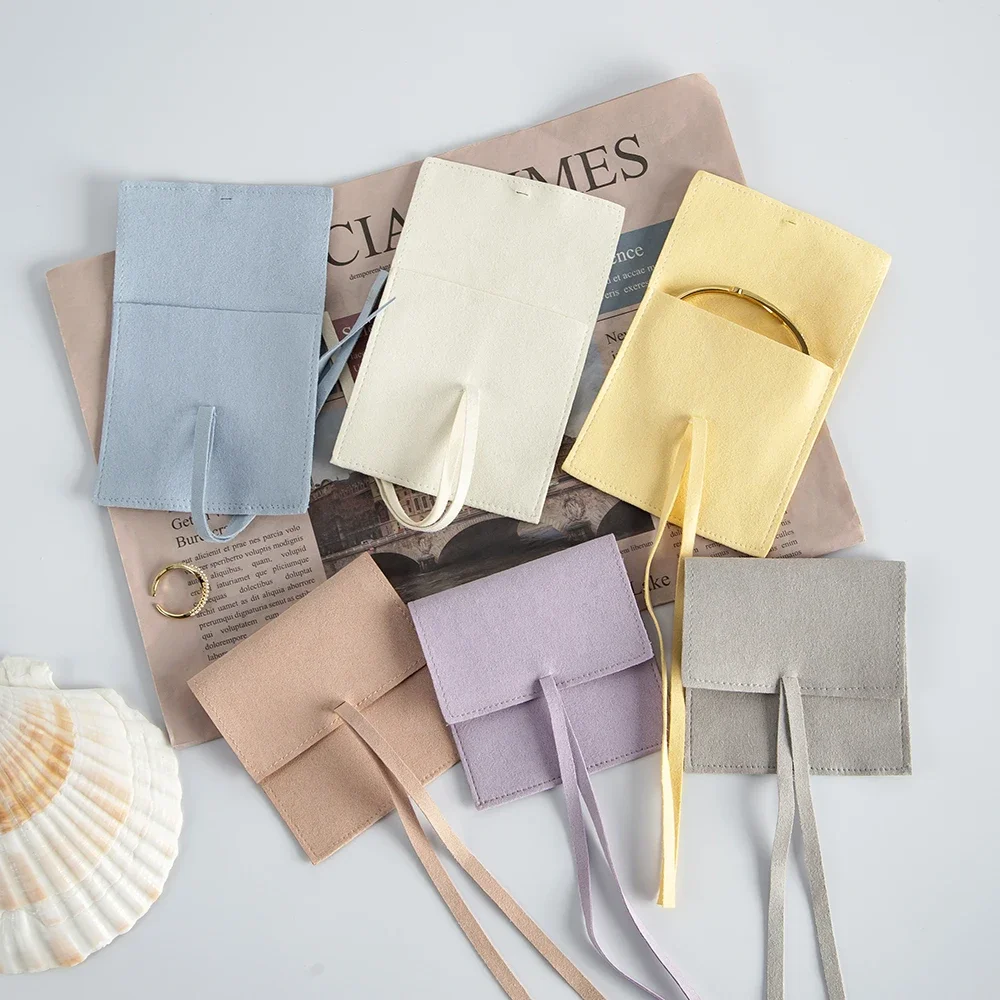 5Pcs Lovely Jewelry Microfiber Bag Velvet Suede Envelope Bag with Rope Jewelry Packaging Pouch Wedding Favors Gift Box Organizer
5Pcs Lovely Jewelry Microfiber Bag Velvet Suede Envelope Bag with Rope Jewelry Packaging Pouch Wedding Favors Gift Box Organizer