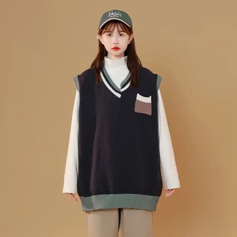 Autumn Japanese irregular V-neck layered vest sweater college style fashion couple outfit
Autumn Japanese irregular V-neck layered vest sweater college style fashion couple outfit