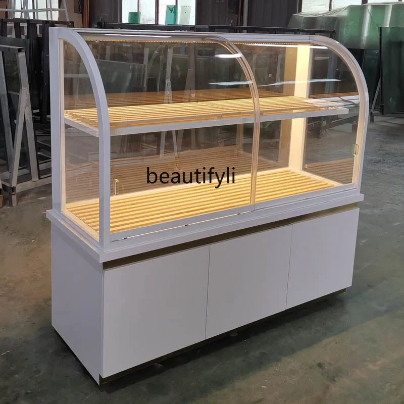 Bread middle island cabinet titanium-plated stainless steel arc middle island cake model cabinet glass
Bread middle island cabinet titanium-plated stainless steel arc middle island cake model cabinet glass