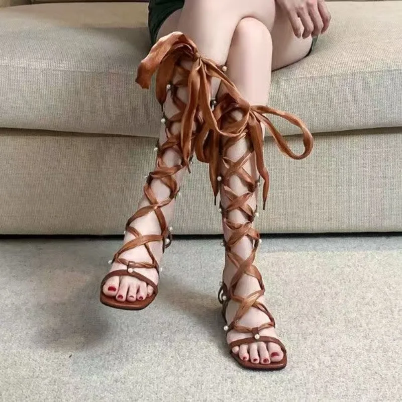 Женские сандалии из натуральной кожи в римском стиле, лето 2026, новая модная модель с перекрестными ремешками, открытым носком и длинными голенищами, прохладные сапоги
Женские сандалии из натуральной кожи в римском стиле, лето 2026, новая модная модель с перекрестными ремешками, открытым носком и длинными голенищами, прохладные сапоги
