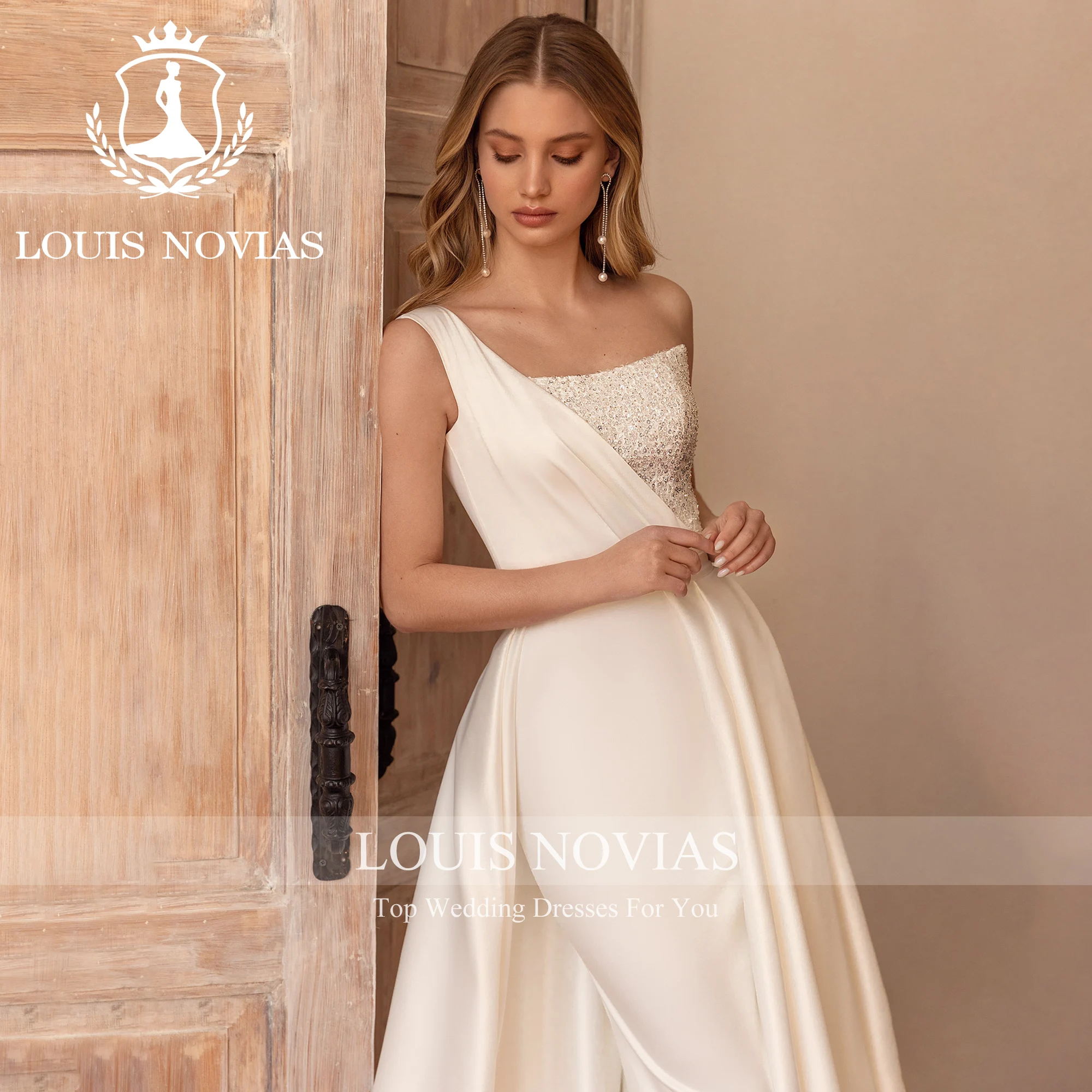 LOUIS NOVIAS Новое поступление свадебное платье на одно плечо блестящий тюль со съемным шлейфом атласное свадебное платье Vestidos De Novia
LOUIS NOVIAS Новое поступление свадебное платье на одно плечо блестящий тюль со съемным шлейфом атласное свадебное платье Vestidos De Novia