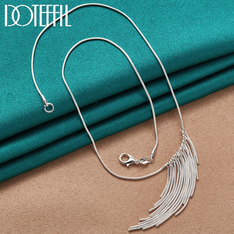 DOTEFFIL 925 Sterling Silver 18 Inch Snake Chain Multi-line Flowing Pendant Necklace For Women Fashion Party Charm Jewelry
DOTEFFIL 925 Sterling Silver 18 Inch Snake Chain Multi-line Flowing Pendant Necklace For Women Fashion Party Charm Jewelry