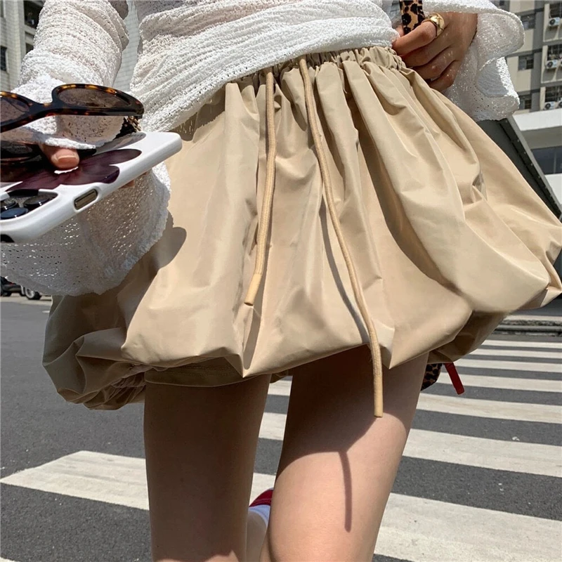 Y2K Women Fashion Mini Bubble Skirts Casual Summer Solid Color Elastic Drawstring Skirt for Beach Vacation Club Streetwear
Y2K Women Fashion Mini Bubble Skirts Casual Summer Solid Color Elastic Drawstring Skirt for Beach Vacation Club Streetwear