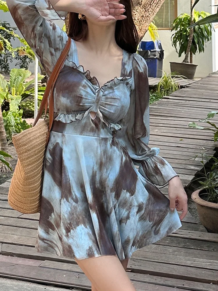 Элегантный повседневный цельный купальник с длинным рукавом, термостойкий, для пляжного отдыха, женский, больших размеров, с V-образным вырезом, из нейлона, спандекса и полиэстера.
Элегантный повседневный цельный купальник с длинным рукавом, термостойкий, для пляжного отдыха, женский, больших размеров, с V-образным вырезом, из нейлона, спандекса и полиэстера.