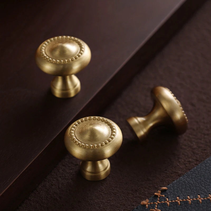 French-style brass cabinet door handle gold single-hole furniture door handle for cabinets, wardrobes, and drawers
French-style brass cabinet door handle gold single-hole furniture door handle for cabinets, wardrobes, and drawers