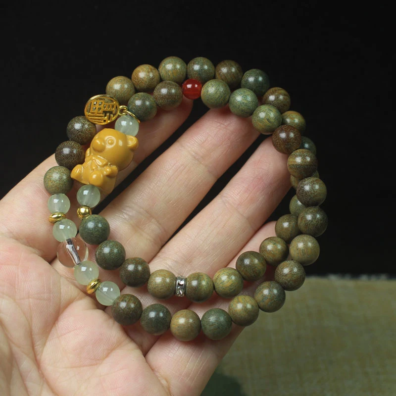 Green sandalwood bracelet with a light fragrance, bear-shaped bracelet for women, decorative Buddhist prayer beads
Green sandalwood bracelet with a light fragrance, bear-shaped bracelet for women, decorative Buddhist prayer beads