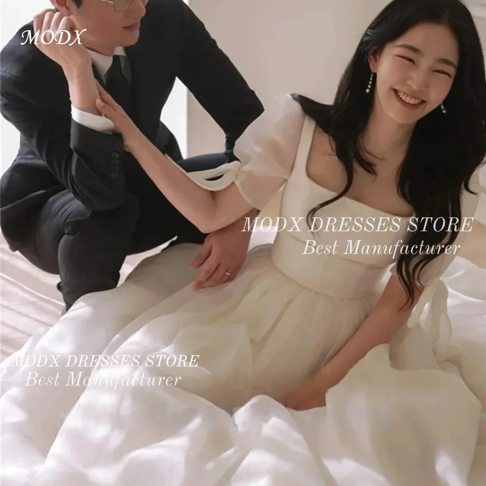 MODX Simple Square Neck Korea Garden Wedding Dresses Puff Sleeves Princess Customized Organza Bride Gowns Party Bride
MODX Simple Square Neck Korea Garden Wedding Dresses Puff Sleeves Princess Customized Organza Bride Gowns Party Bride